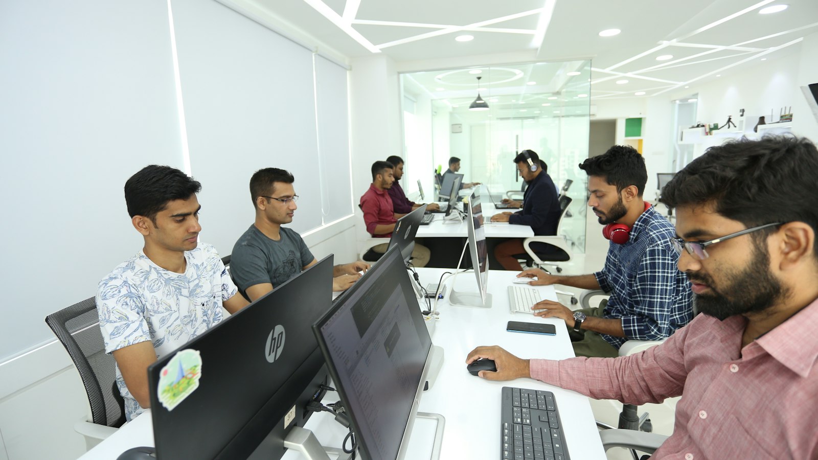 Software developers at work in an office